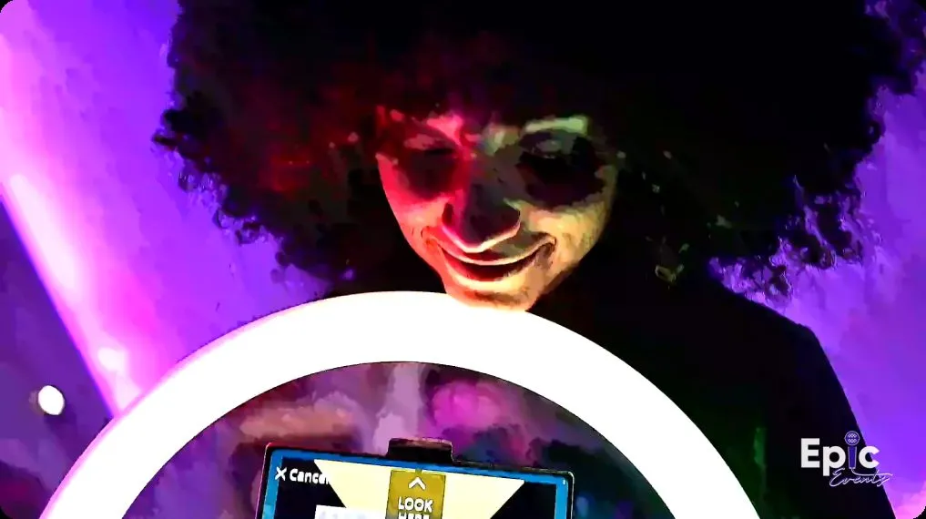 Guest under a roaming photo booth ring light at a DMV event.